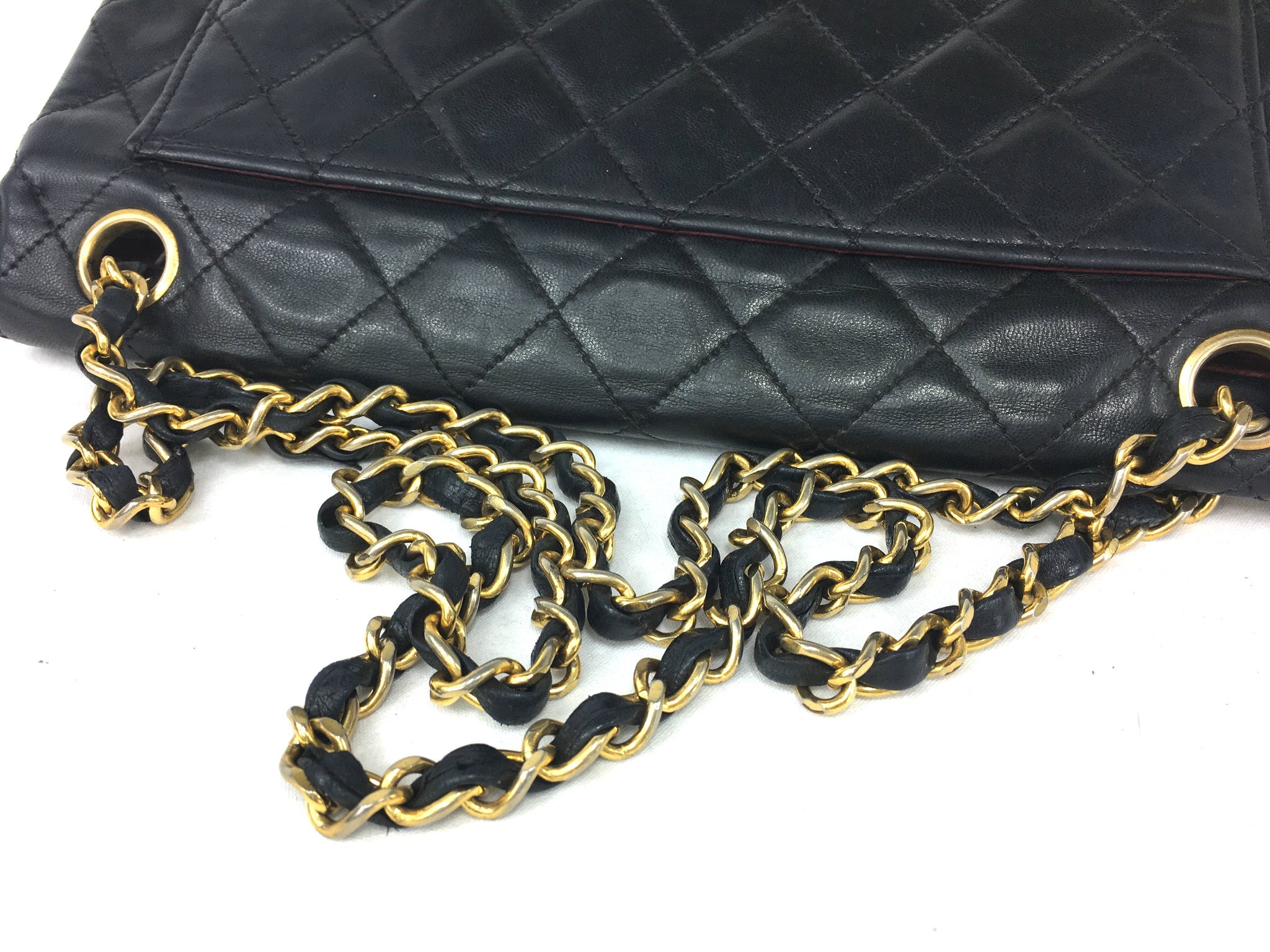 CHANEL Black Quilted Double-Flap Bag
