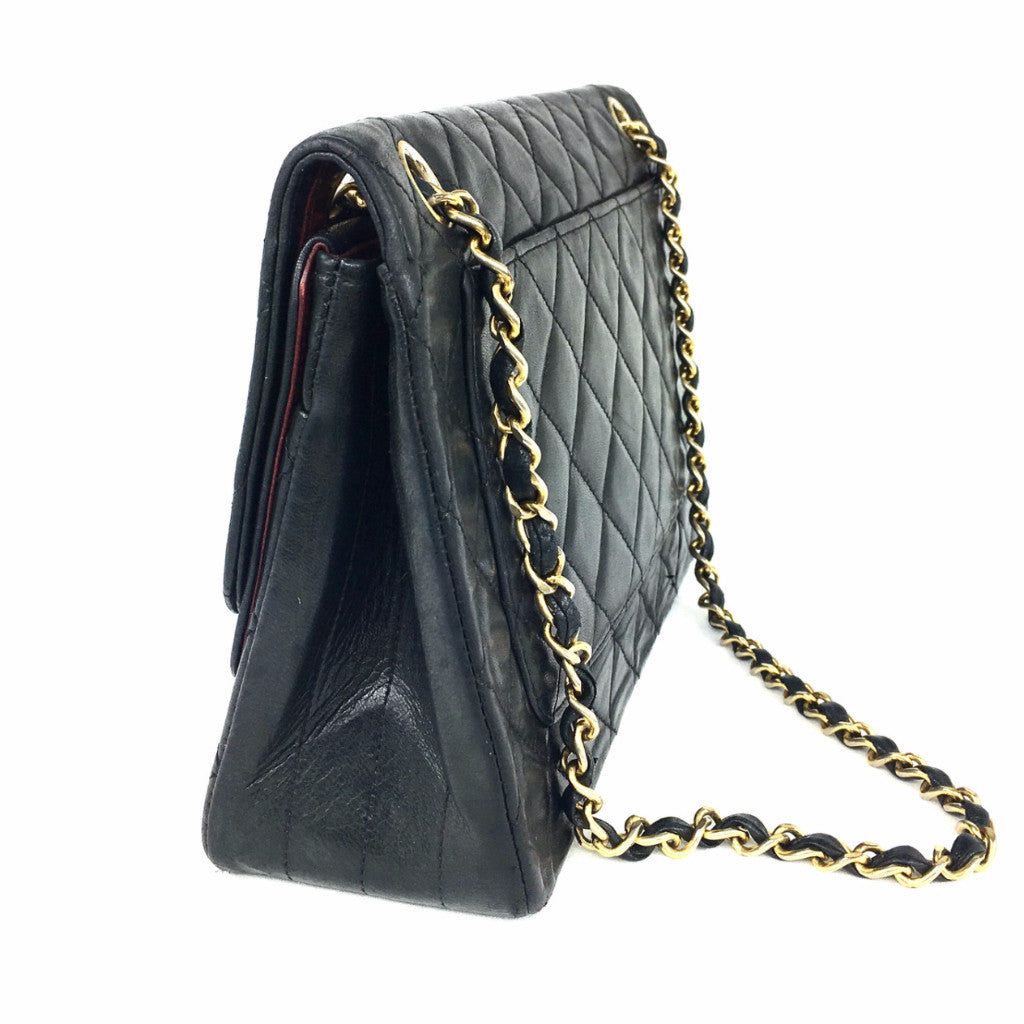 CHANEL Black Quilted Double-Flap Bag
