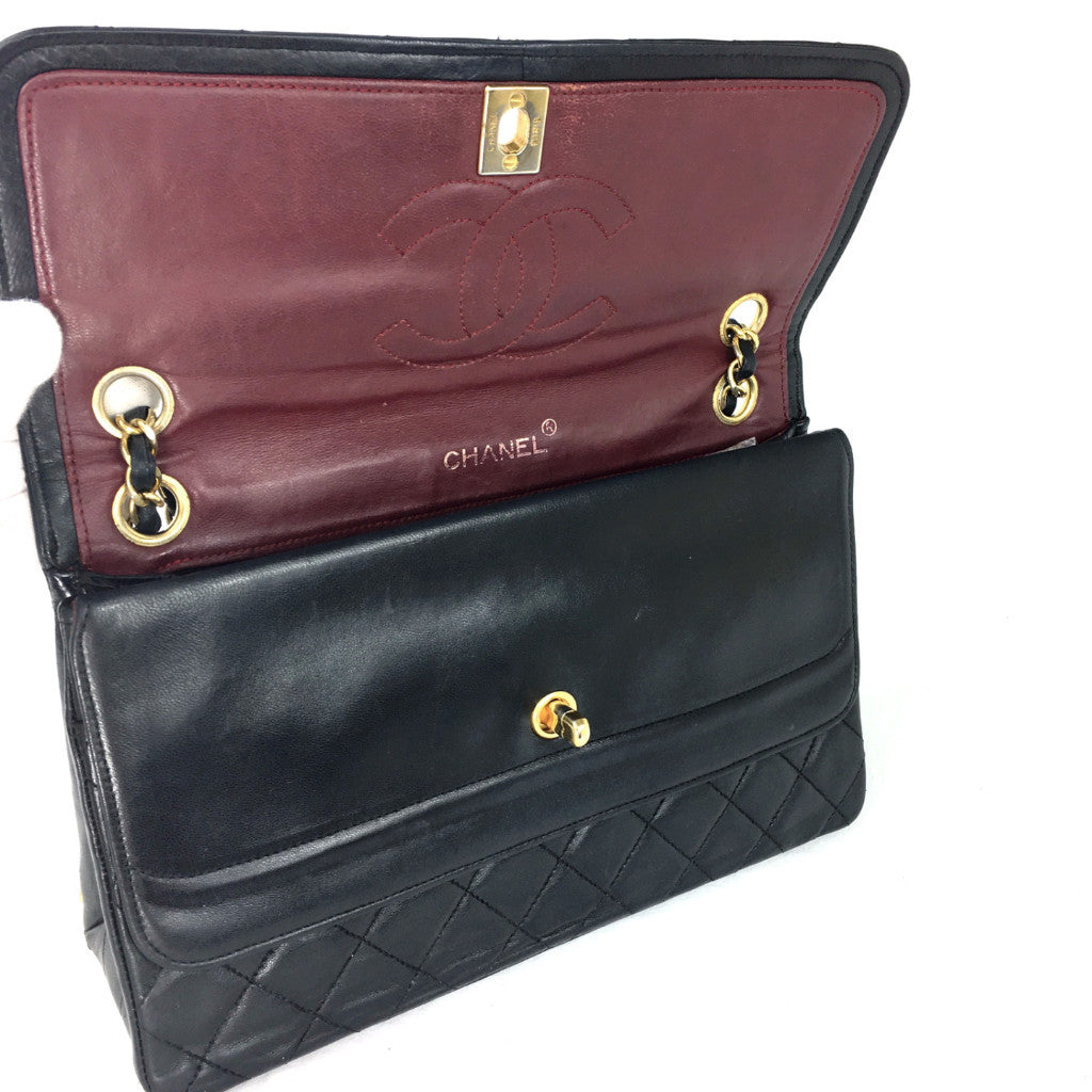 CHANEL Black Quilted Double-Flap Bag