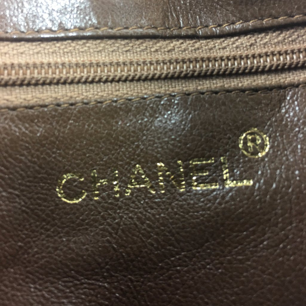 CHANEL Lizard Leather Crossbody Tassel Bag