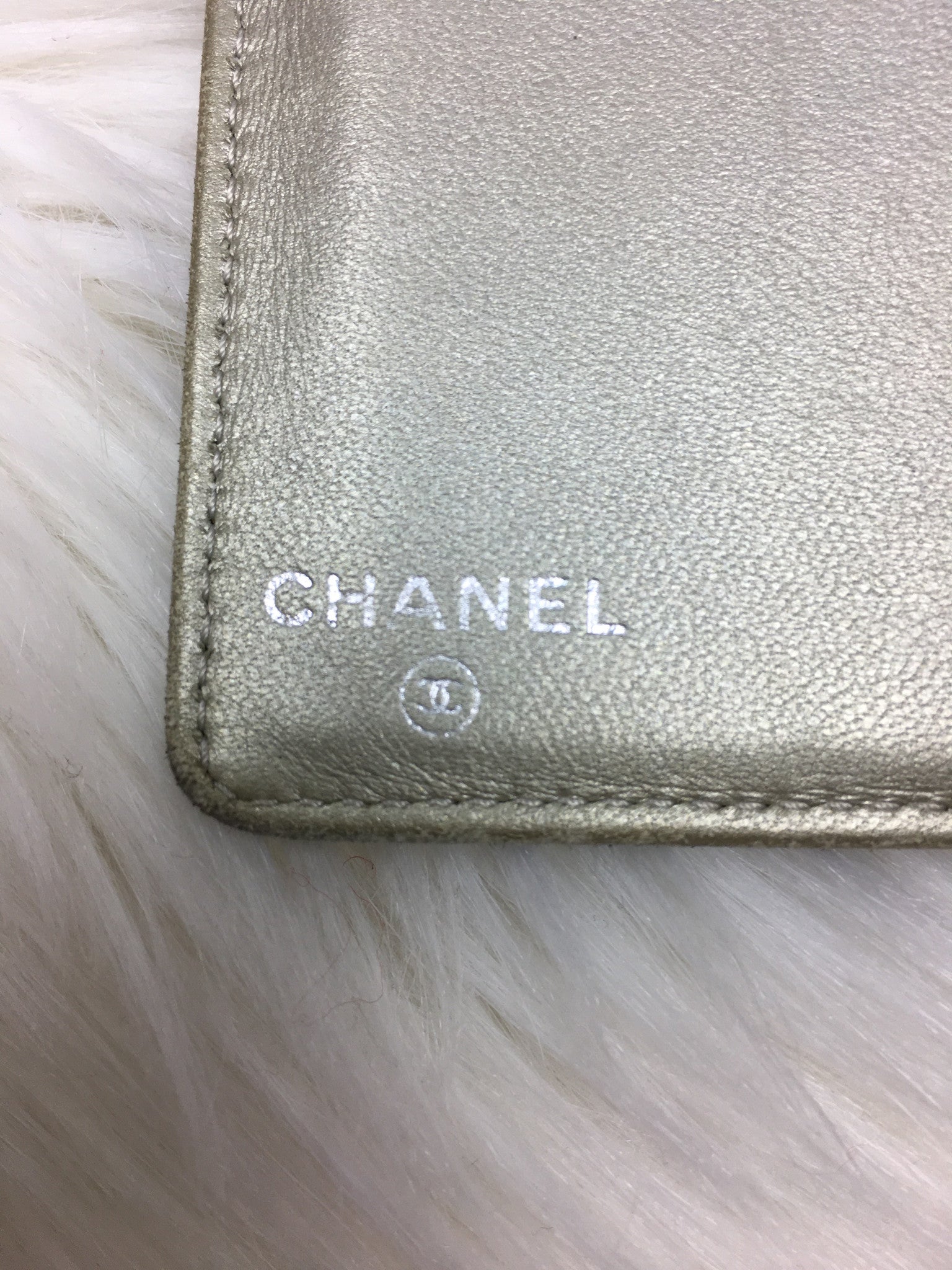 CHANEL Embossed Black Wallet