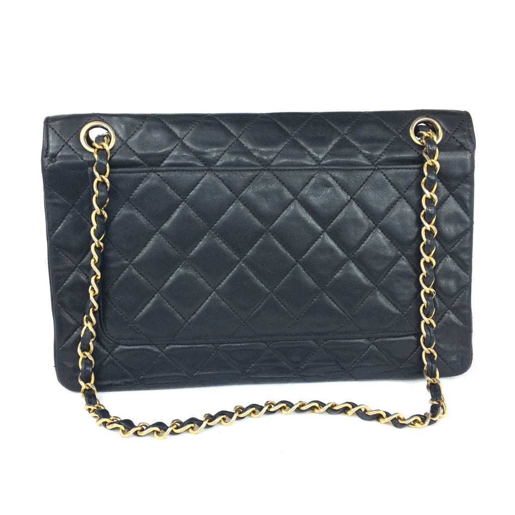 CHANEL Black Quilted Double-Flap Bag