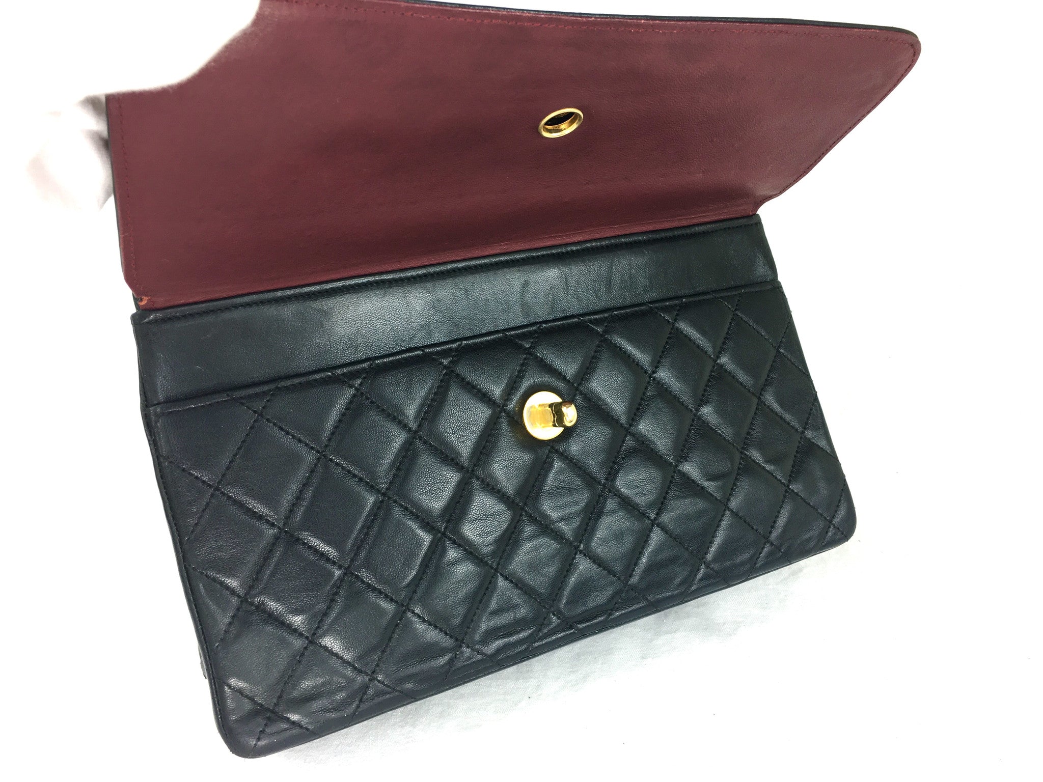 CHANEL Black Quilted Double-Flap Bag