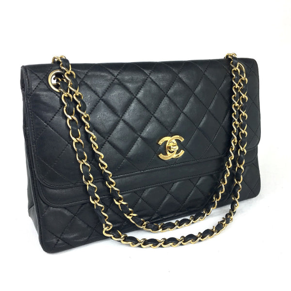 CHANEL Black Quilted Double-Flap Bag