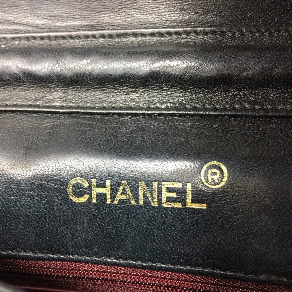 CHANEL Black Lambskin Flap Bag