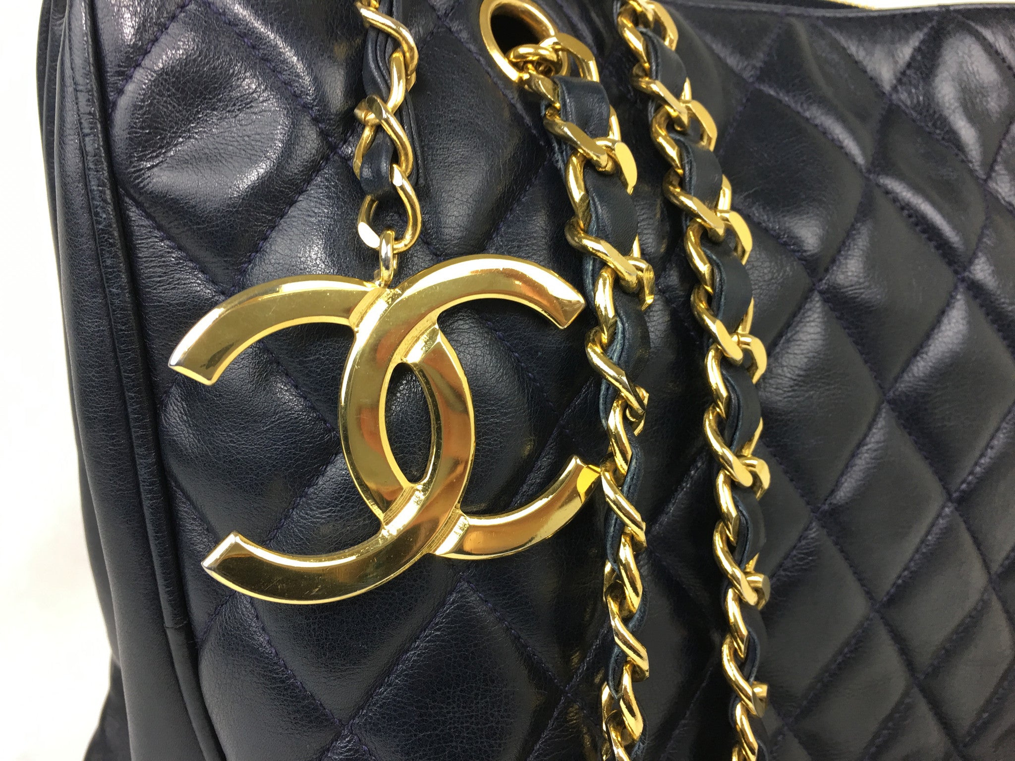 CHANEL Dark Navy Lambskin Quilted CC Charm Shoulder Bag