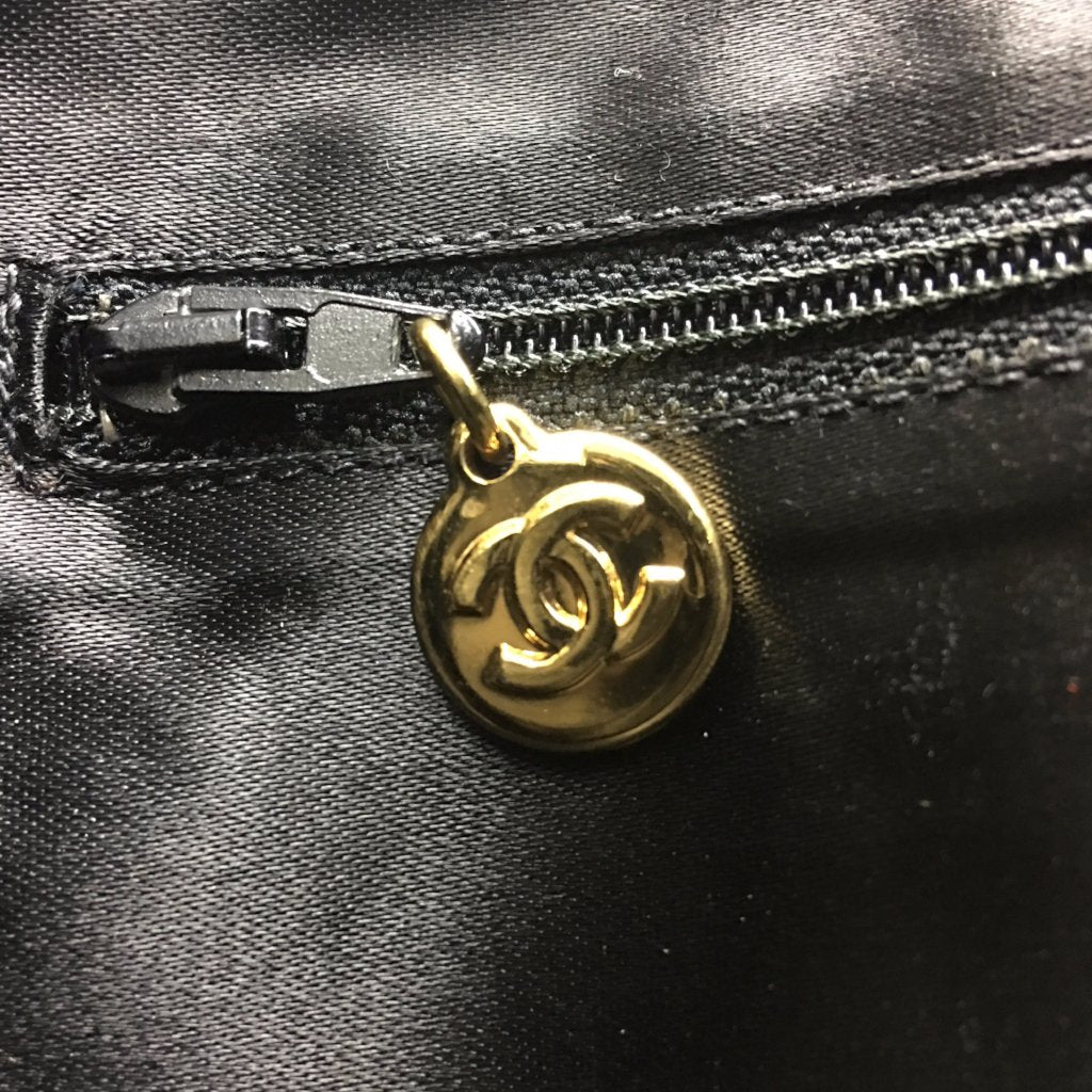 CHANEL Black Vinyl Backpack